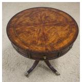 1107	OUTSTANDING CENTURY MONARCH ROUND LAMP TABLE/DRUM TABLE WITH 4 DRAWERS, BANDED BOOK MATCHED TOP