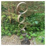 WHITMORE BOOGAERTS STEEL SCULPTURE | Having graduated steel circles welded together on spring base, 