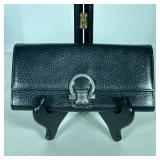 FERRAGAMO EVENING CLUTCH | Black leather Ferragamo evening bag. - l. 7.5 x w. 4 x h. 3.5 in