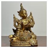 GILT WOOD THAI FIGURE | Gilt and jeweled carved wood Thai Singha figure. - h. 8.5 x w. 6 x d. 4.25 i