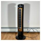 LASKO STANDING FAN | Lasko standing roaring fan with 3 speeds, timer, and faux wooden front. - h. 41