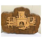 Artwork - Winter Cabin | Vintage carved scroll mounted on wood of man and dog in a winter cabin scen