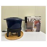 Swissmar Fondue Maker | Swissmar "Sierra" cast iron fondue maker includes: Fondue pot Removable spla