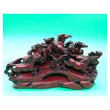 A Chinese Feng Shui artwork done in heavy resin for attraction of positive energy at 8" long.