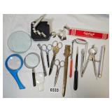 Magnifying glasses, scissors, letter openers, magnets, scales, laser pen, desk pen, and mirror. One 