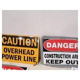 Plastic DANGER Keep Out Sign and Metal CAUTION Overhead Power Line Sign
