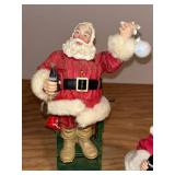BASEMENT - Collection of Coca-Cola Santa Figurines with Animals and Toys