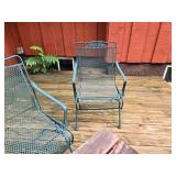 Two Metal Patio Chairs and Small Wooden Table