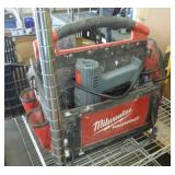 Milwaukee tool caddy with tools and heat gun