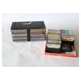 Music CD’s in Stacking Display Case, Cassette Tapes…
