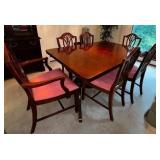 Beautiful Mahogany Dining Table with 6 Chairs Measuring 60" X 40" With Carved Feet, 2 Leaves, Padded Cover