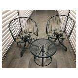 Pair Of Metal Swivel Patio Chairs, And Matching Table. No Cushions Included. Measuring 24" X 22" X 30" Tall