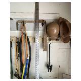 Everything Pictured Goes! Garage Cabinet, Garage Items, Helmet, Hat, Bungee Cords, Fireplace Maintenance Tools, Garden Tools, Hand Tools and More!