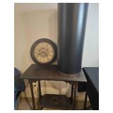 Vintage Wooden Side Table with Shelf, Metal Storage Cylinder, and Antique Wall Clock