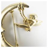 Danecraft Cherub Swinging From Crescent Moon Gold Plated Base Metal Brooch .