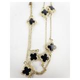 Black Enamel 4 Leaf Clover Gold Tone Base Metal Station Necklace.