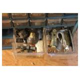 Assorted Hardware Storage with Pipe Thread Stick and Various Fasteners