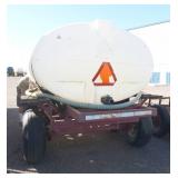 1,000 gallon poly tank on running gear, with pump and motor