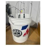 Bucket of Ice Fishing rods and misc