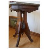 Antique marble top table on casters