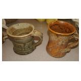 Group of Eleven pottery mugs