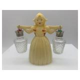 Vintage Plastic Dutch Girl Carrying a Set of Salt and Pepper Glass Shakers