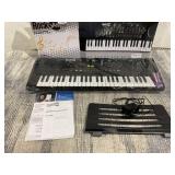 RockJam 49 Key Keyboard Piano with Power Supply, Sheet Music Stand