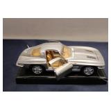 Die-Cast Model of Silver 1963 Chevrolet Corvette Stingray - Open Doors