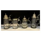 Four Clear Glass Steins