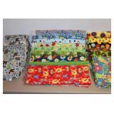 Assorted Children’s Soft Flannel Fabrics Jungle, Dr. Seuss, Debbie Mumm, Sports Etc. Baby Blankets, Bibs, Doll Clothes Etc…