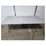 Used Folding Table with Gray Surface