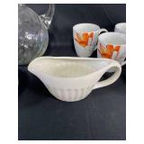 Collection of Tableware Including Glass Pitcher, Creamer, and Set of Floral Mugs