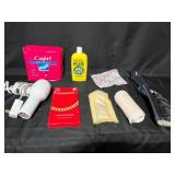 Mixed Lot of Health and Personal Care Items including Bladder Pads, Wrist Supports, Jewelry Cloth, and More