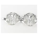 Selini  Balance The Yoke Motif Silver Tone Base Metal Bracelet & Clip-On Earrings.