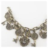 Antiqued Lock & Coin Key Gold Tone Base Metal Charm Bracelet.