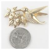 Swarovski Rhinestone Accented Hummingbird & Flowers Gold Tone Base Metal Brooch .