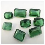 Group of 8 EMERALD GREEN GLASS - 150.01ct. Many Different Cuts