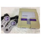 Super Nintendo Entertainment System SNE-001 with 2 OEM controllers and one brand new controller