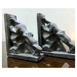 Pair of Men Pushing Against Each other Bookends