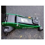 Black, green, and blue car floor jacks with gray handle. Pittsburgh 1.5-ton, Daytona 1.5-ton