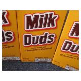 4- 10 oz Milk Duds...