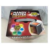 New Handy Heater Pure Warmth Ceramic Space Heater with LED Lights