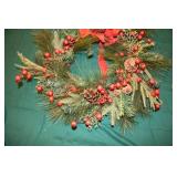 Decorative Christmas Wreath with Pine Cones and Red Berries