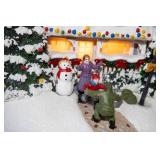 Illuminated Christmas Village House with Figurines and Snowman