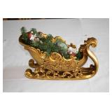 Vintage Christmas Sleigh with Figurines and Evergreen Accents