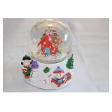 Holiday Snow Globe Featuring Snowman and Children with House Design