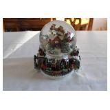 Christmas Themed Snow Globe Featuring Santa Claus with Village Scene