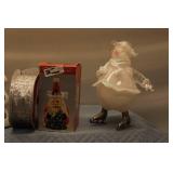 Collection of Holiday Decor Items Including Ornaments, Night Light, and Decorative Figures