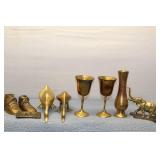 Collection of Brass Decorative Items Including Goblets, Ducks, and Vintage Baby Shoes