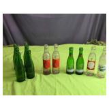 Collection of 12 Vintage Soda Bottles Including Go-For Brand and Crown Club